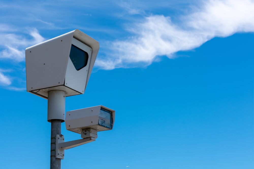 A red light camera. Learn about whether red light cameras are legal in Texas.