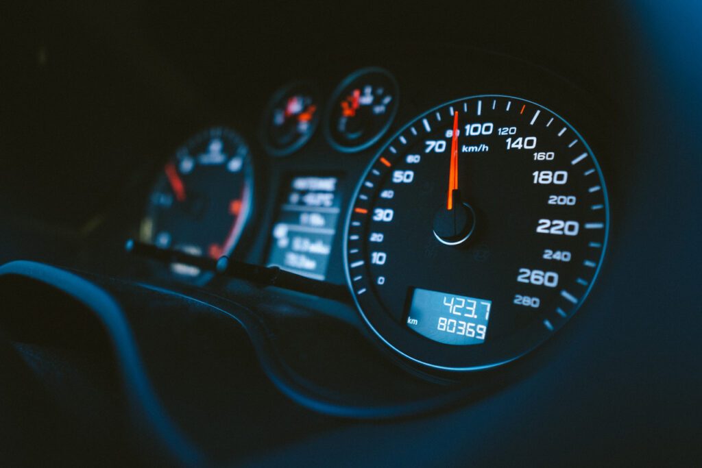 A car speedometer. What speed is considered reckless driving in Texas?